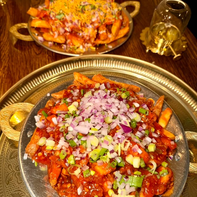 Chili Chicken Loaded Masala Fries.