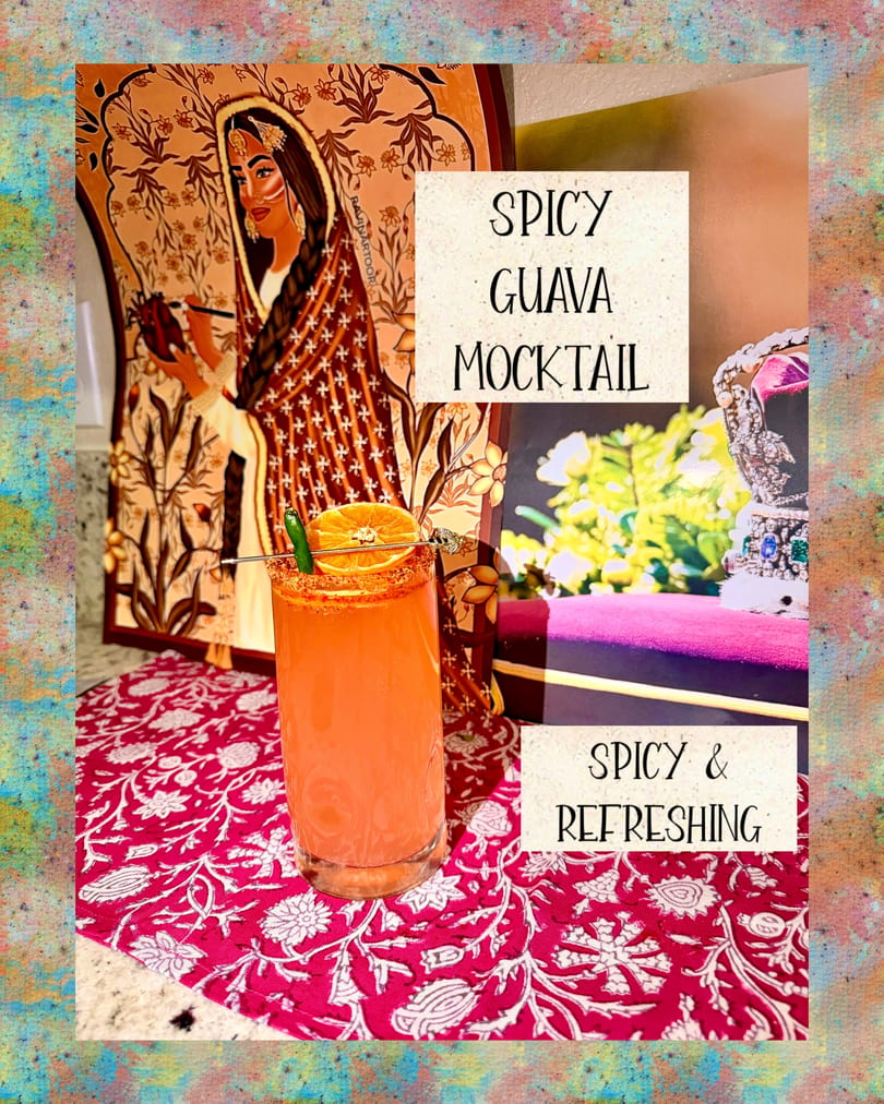 Spicy Guava Mocktail garnished with orange and chili, on a red floral placemat.
